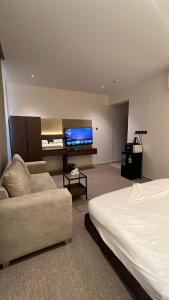 Postel nebo postele na pokoji v ubytování نزل الدار للغرف الفاخره