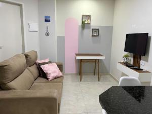 Televiisor ja/või meelelahutuskeskus majutusasutuses Bella Peroba Flats #Lua de Mel Hidromassagem - Maragogi AL