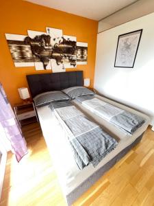 Postel nebo postele na pokoji v ubytování Apartment in der Nähe vom Lendplatz