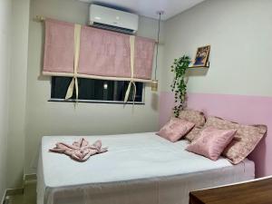 Voodi või voodid majutusasutuse Bella Peroba Flats #Lua de Mel Hidromassagem - Maragogi AL toas +8 fotot