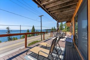 a balcony with chairs and a view of the ocean at Big Blue Views Walk 2 Lake in Tahoe Vista