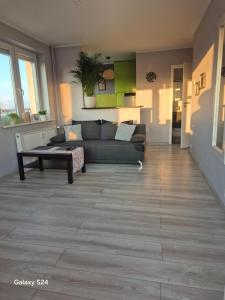 Posedenie v ubytovaní Apartament Długie Ogrody 2 pokojowy