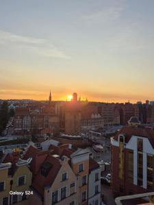 Pohľad na východ alebo západ slnka z apartmánu alebo blízkeho okolia