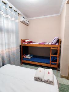 Cama o camas de una habitación en CEDE Inn Hotel