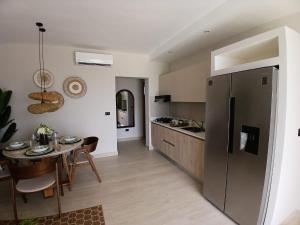 Kuchyň nebo kuchyňský kout v ubytování Caribbean Apartment
