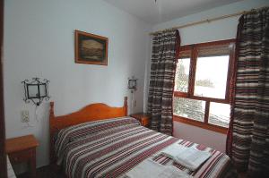 Postel nebo postele na pokoji v ubytování Apartamentos Turísticos Rural Los Tinaos