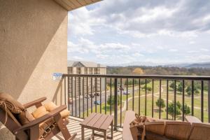 a balcony with a view of a parking lot at Mountain View Condo 3702 in Pigeon Forge