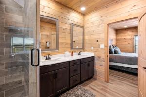 a bathroom with a sink and a shower at The Phoenix in Cove Creek Cascades +71 photos