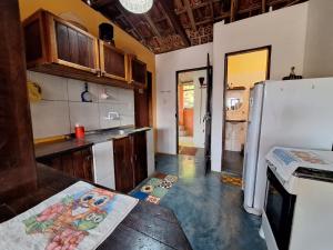 Dapur atau dapur kecil di Hospedagem Mel de cacau +6 gambar