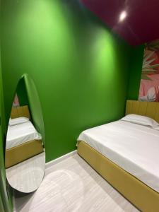 Voodi või voodid majutusasutuse Funky Breeze by the Sea toas