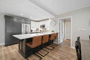 a kitchen with a large island in the middle at St James Place 216 in Beaver Creek