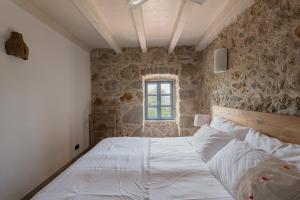 Postel nebo postele na pokoji v ubytování Holiday Home Stancija Srem + 42 fotografií