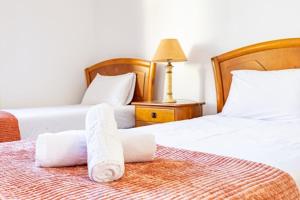 Ένα ή περισσότερα κρεβάτια σε δωμάτιο στο Silva Retreat Villa
