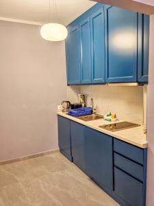 Kuchyň nebo kuchyňský kout v ubytování Aria Seaview Apartments