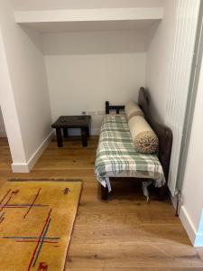 Voodi või voodid majutusasutuse Charming Apt at the heart of Richmond London plus parking toas