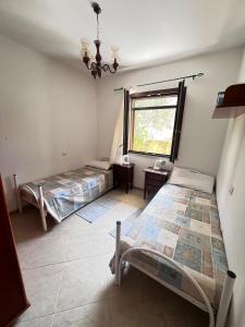 Katil atau katil-katil dalam bilik di Guest House Zia Maria +3 gambar