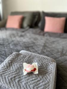 a star on top of a bed at Premium Apartment Wohlfühl-Oase mit Pool und Sauna in Sankt Englmar +42 photos