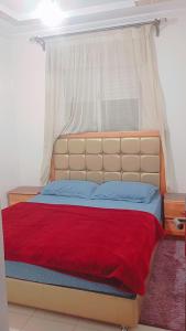 Voodi või voodid majutusasutuse Glamour Appartement toas