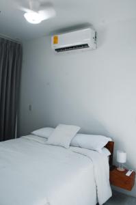 Postel nebo postele na pokoji v ubytování Blue Banana Villas