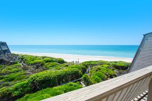 a view of the beach from the balcony of a house at PKOG09 Ocean Grove G4 in Pine Knoll Shores