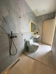 Ένα μπάνιο στο SUNNY BEAM Pool Villa Cha-am