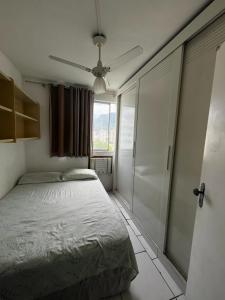 Ένα ή περισσότερα κρεβάτια σε δωμάτιο στο Aluga se quarto individual não compartilhado