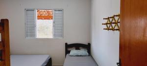 Postel nebo postele na pokoji v ubytování Chácara Primavera, visual único! + 81 fotografií