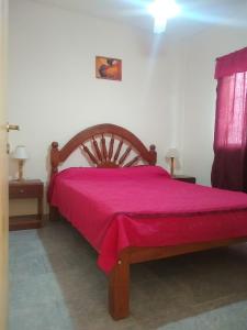 Ένα ή περισσότερα κρεβάτια σε δωμάτιο στο Complejo Llaipen