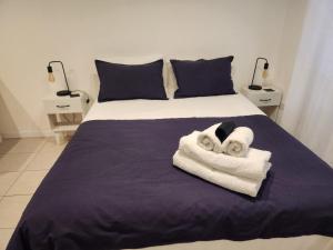 Postel nebo postele na pokoji v ubytování Luminoso y cálido atardecer