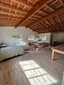 Ένα ή περισσότερα κρεβάτια σε δωμάτιο στο Casa de Campo Pé da Serra - Sitio em Campos Novos de Cunha