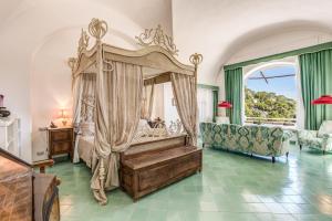 Una cama o camas en una habitación de Villa Calypso