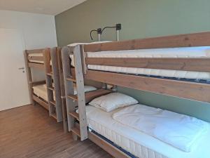 Ein Bett oder Betten in einem Zimmer der Unterkunft Emma Top 1 XL