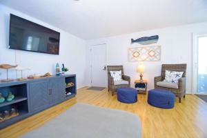 Posezení v ubytování Aronimink 1B condo