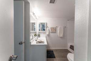 A bathroom at Mesa Riverview 1 BR Apt with King