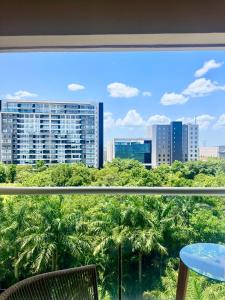 a view of a city skyline from a window at Vía Montejo, Mérida Yucatán in Mérida