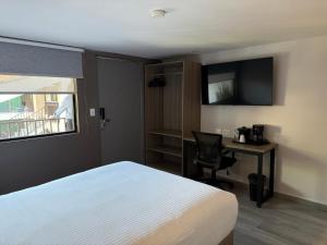 Postel nebo postele na pokoji v ubytování Comfort Inn Hermosillo Pitic