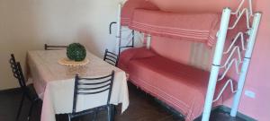 Postel nebo postele na pokoji v ubytování Cabañas el Cortijo