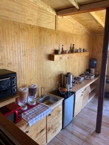 Kuchyň nebo kuchyňský kout v ubytování Hostal Doña Tamy + 18 fotografií