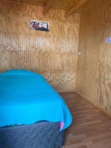Postel nebo postele na pokoji v ubytování Hostal Doña Tamy