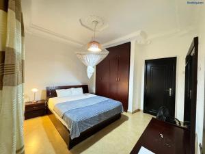 Ένα ή περισσότερα κρεβάτια σε δωμάτιο στο Barazani Garden House