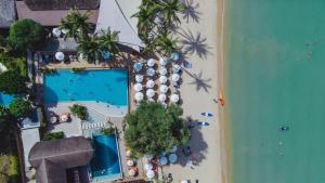 an overhead view of a resort with a swimming pool at Barcelo Coconut Island, Phuket in Phuket Town
