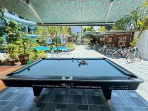Stolní tenis v ubytování Tuan Ngoc Hotel nebo okolí