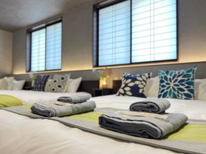 En eller flere senge i et værelse på nestay villa tokyo nippori + 28 billeder