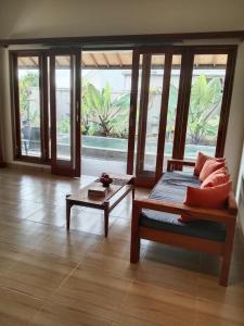 Bengkel Villa - Kedunguにあるシーティングエリア