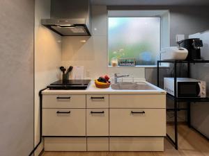 Køkken eller tekøkken på nestay villa tokyo nippori