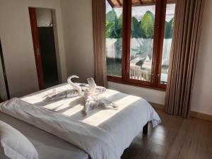 Bengkel Villa - Kedunguにあるベッド