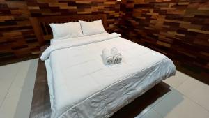 โรงแรมภูน้ำฟ้า - Phunumfha Hotel ชุมแพ客房内的一张或多张床位