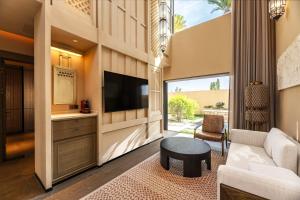 TV a/nebo společenská místnost v ubytování Wanda Ganman Dunhuang