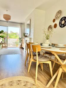 a dining room with a table and chairs at The View on Castle Hill with Lovely Hot Tub in Conwy
