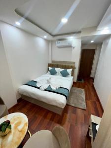 Katil atau katil-katil dalam bilik di Hotel Yuvan